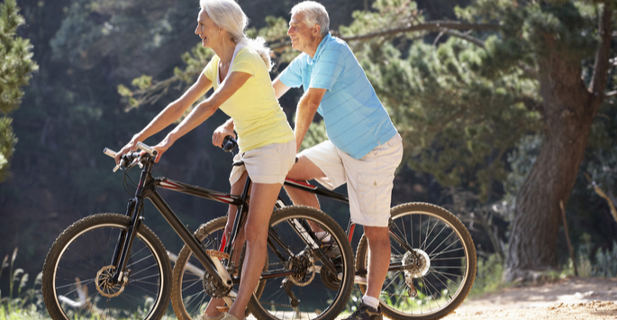 older couple riding bikes