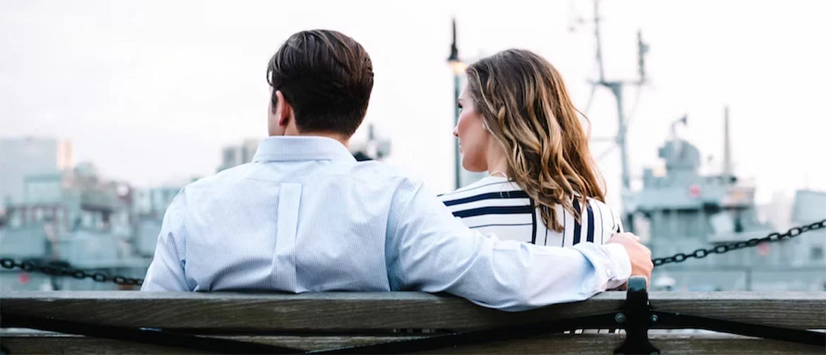 couple sitting on a bench