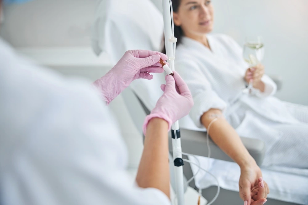woman getting IV nutrient therapy