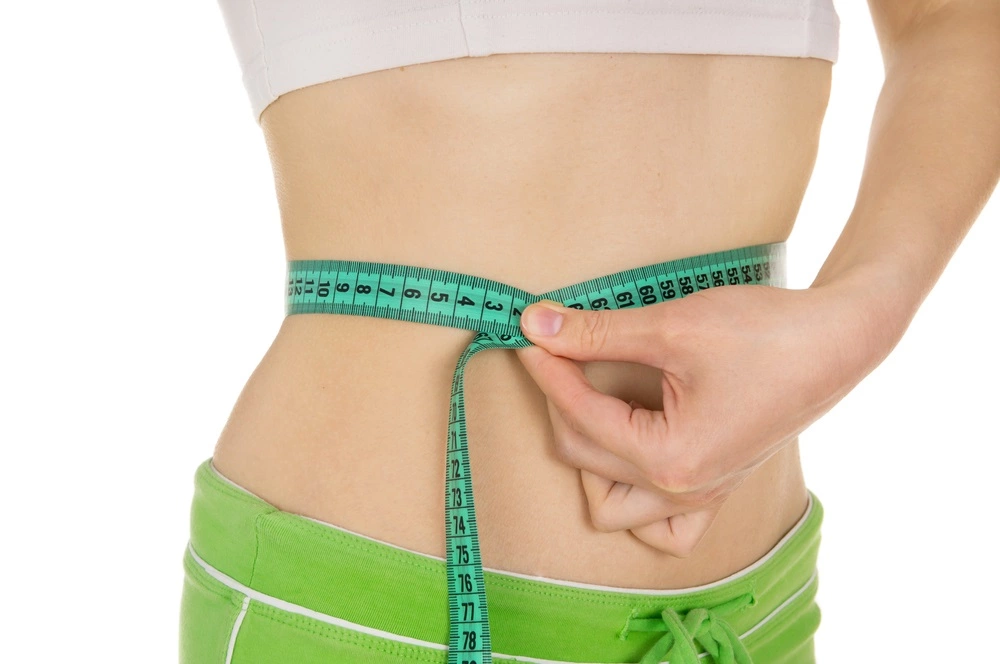 measuring waist during weight management